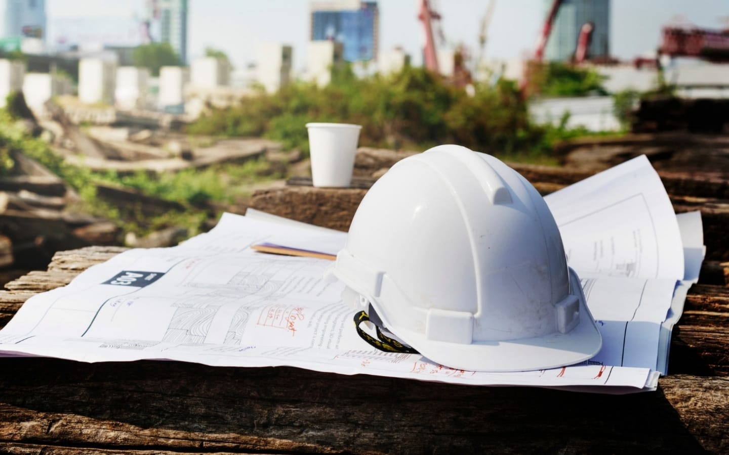 about white top hat map construction site